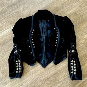 High-end black velvet Western-style jacket with lots of attention to detail.